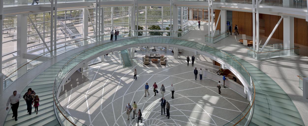 People meeting in the Devon Energy rotunda