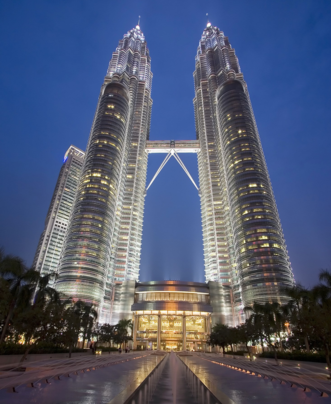 looking up the twin 88-story Petronas Headquarters Towers were recognized in 1996 as the tallest buildings in the world, and have since become the global symbol for Kuala Lumpur and Malaysia