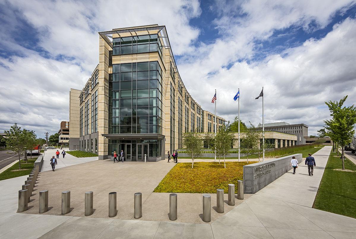 pedestrian view of the five storey Minnesota Senate Building with glass facades located in St. Paul, Minnesota.