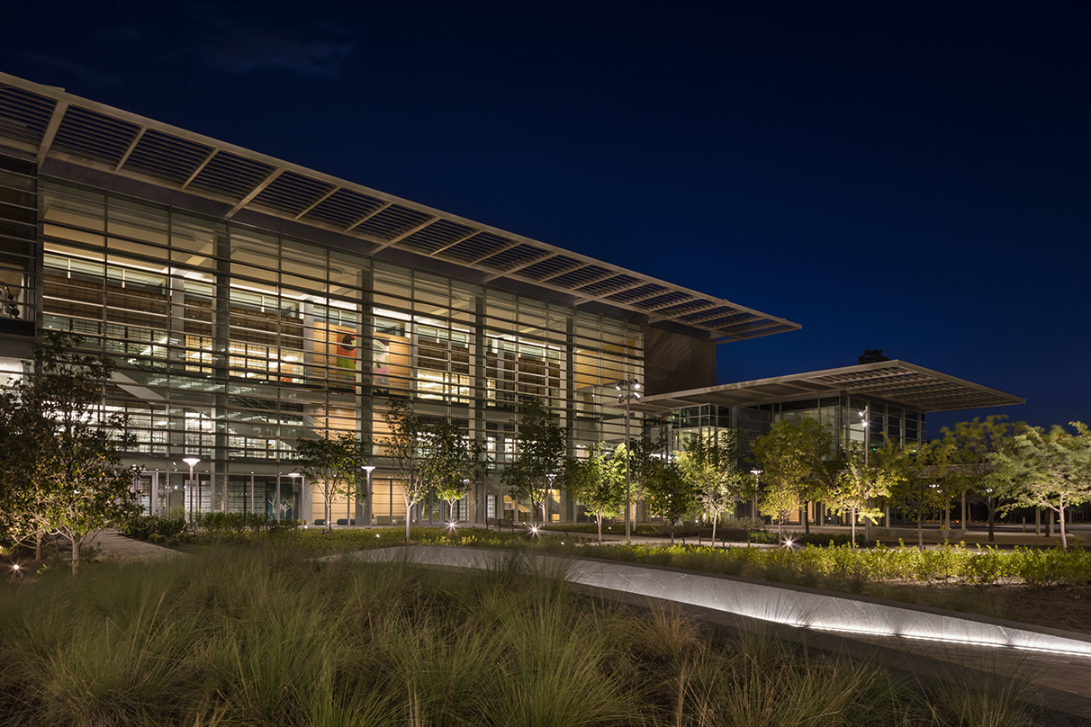 landscape lighting at nignt in front of the ExxonMobil Wellness Center