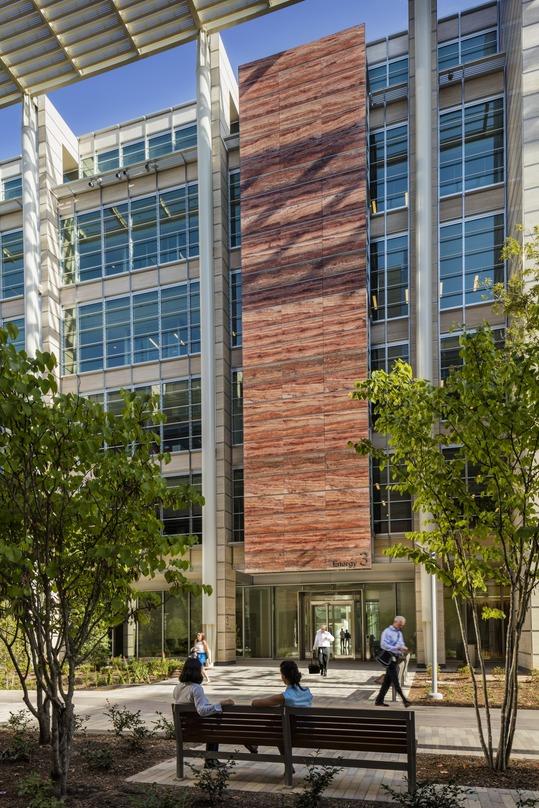 A large stone marker designates the entrance to the ExxonMobil office building