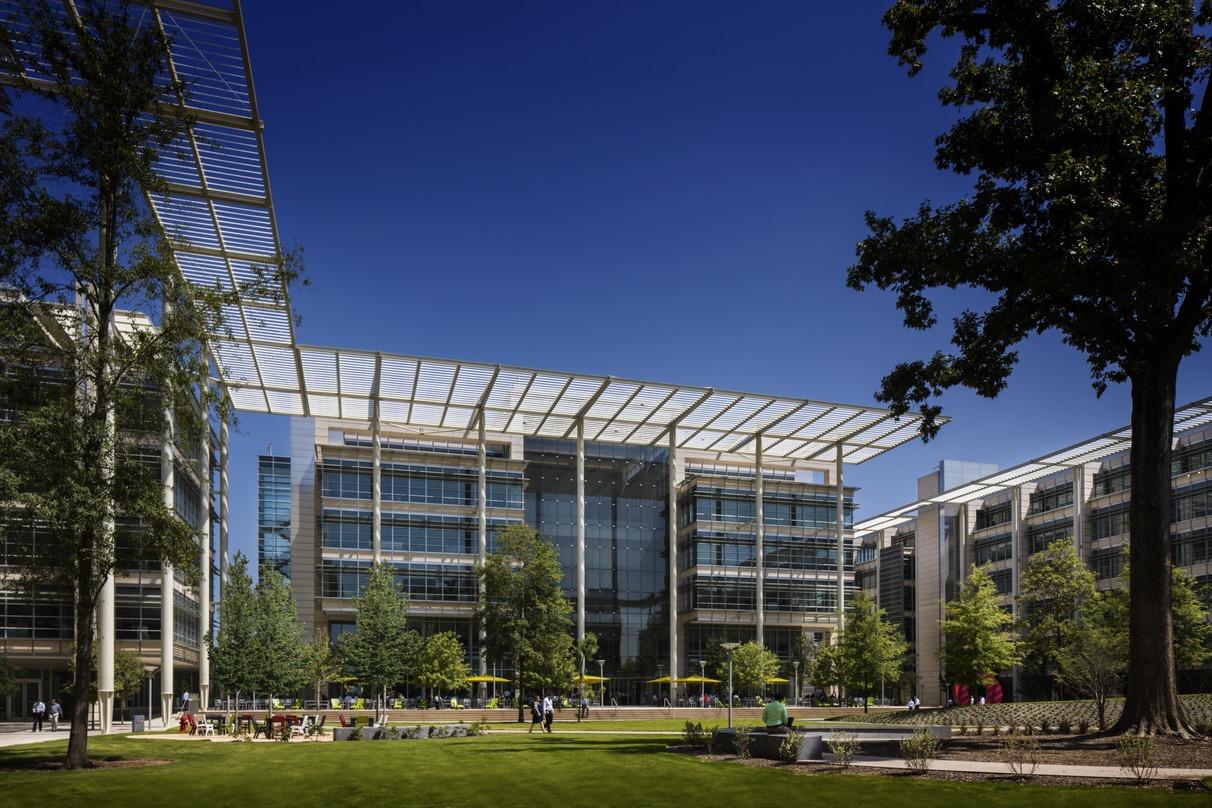 building height glass awnings creating shade for the atrium ExxonMExxonMobil Office Complexobil Office Complex