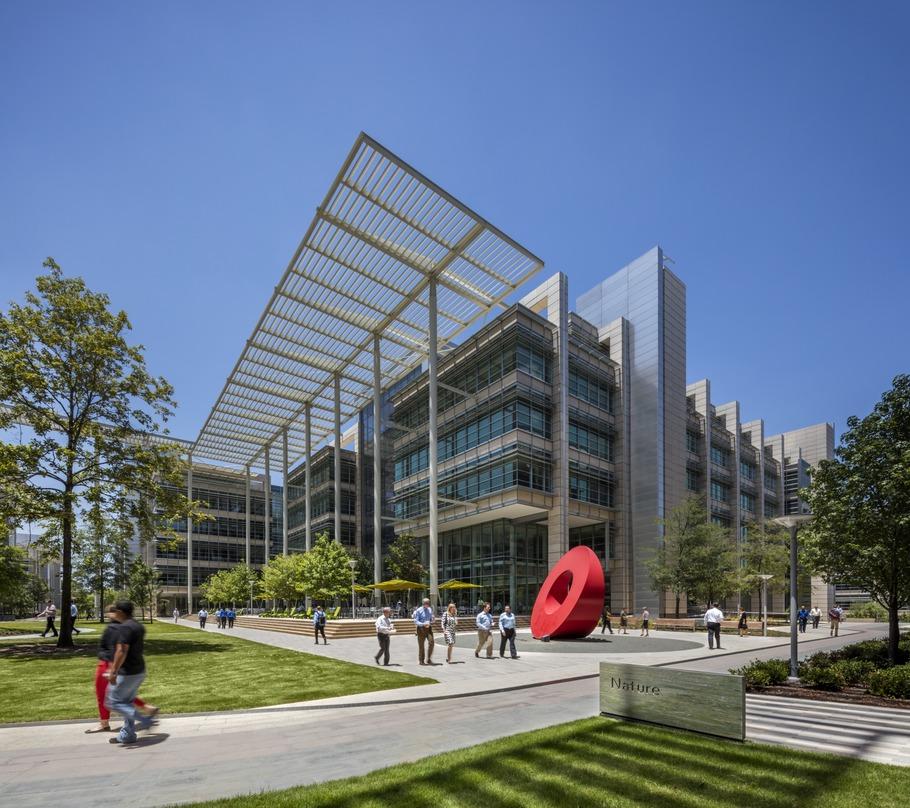 another red sculpture and tall glass awnings ExxonMobil Office Complex