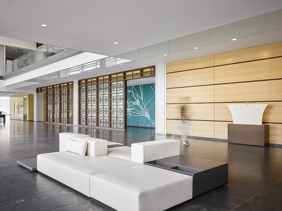 white decorative rectangular seating inside a lobby hall ExxonMobil Wellness Center