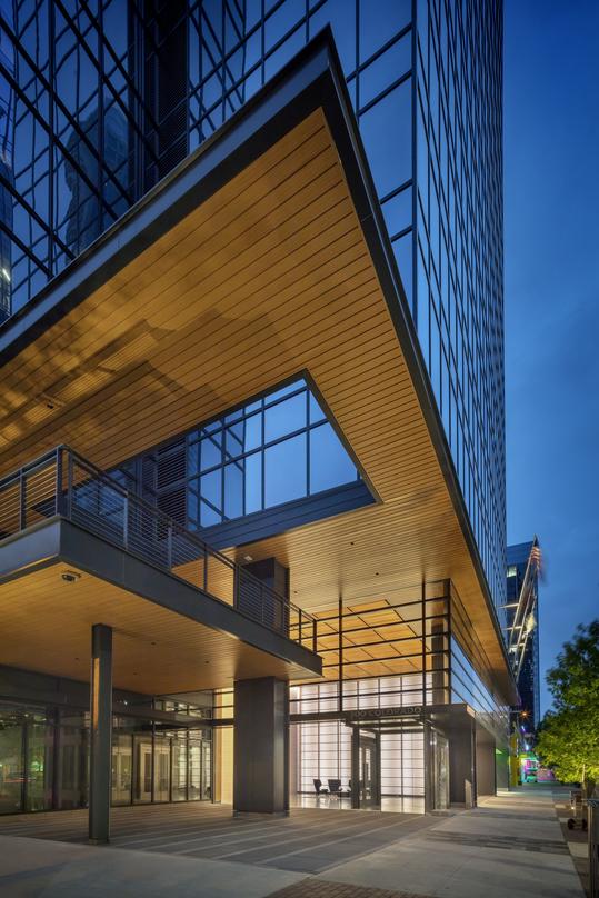 Pedestrian level view of the dining area outside 300 Colorado in downtown Austin, incorporated into our design proposal.