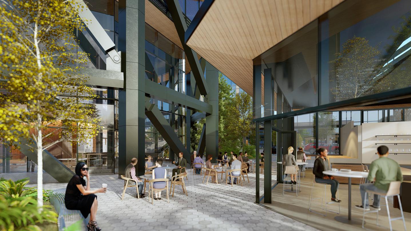 Pedestrian level view of the dining area and iron railings design outside our Class A office development design in Bellevue.