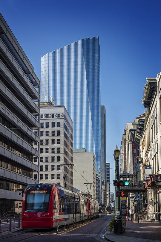 A stree view looking up at the Glass frame walls incorporated into the 609 Main, Class-A next generation office tower in Houston, Texas.