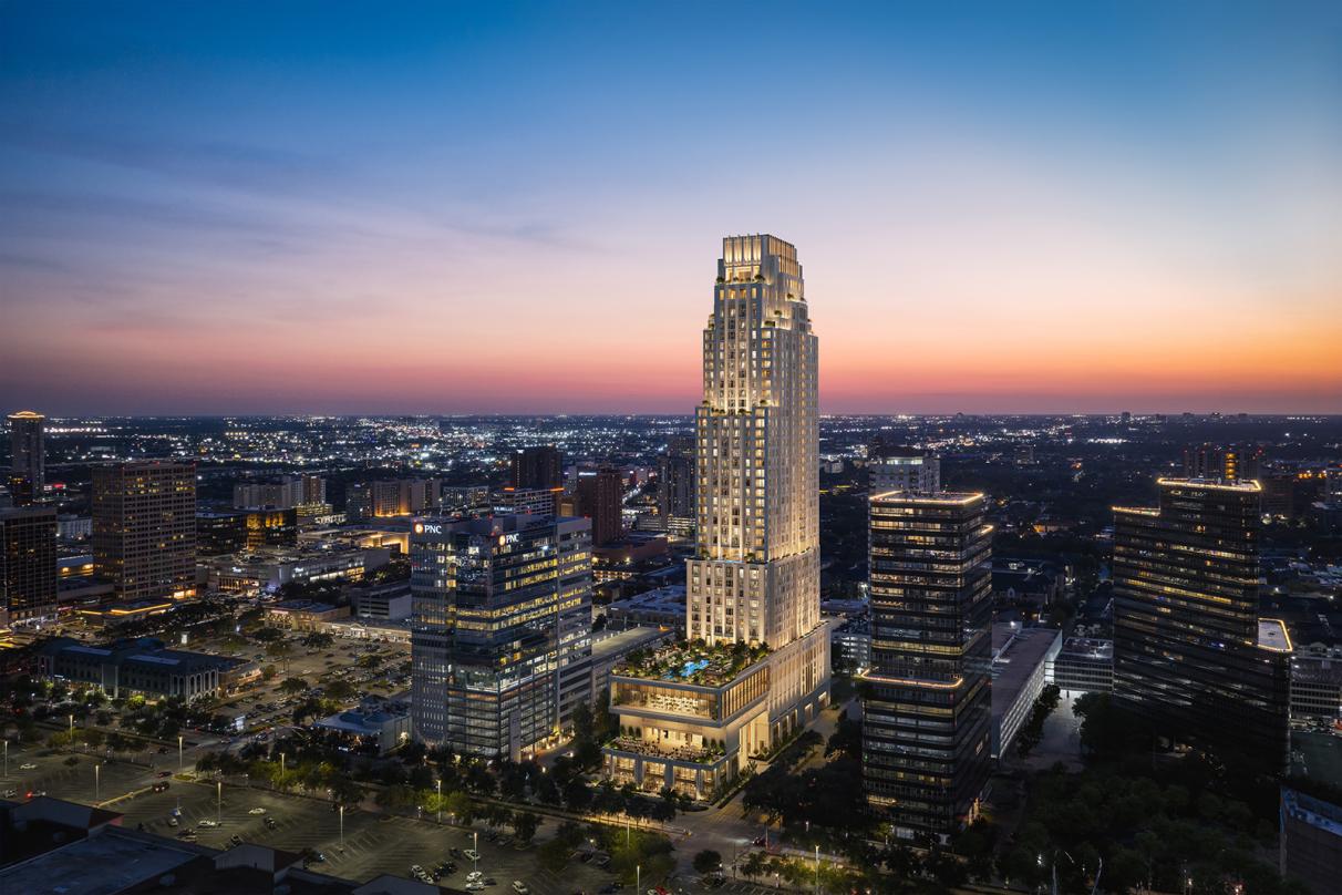 Aerial view of modern high-rise residential building with tiered balconies and vertical architectural fins at sunset
