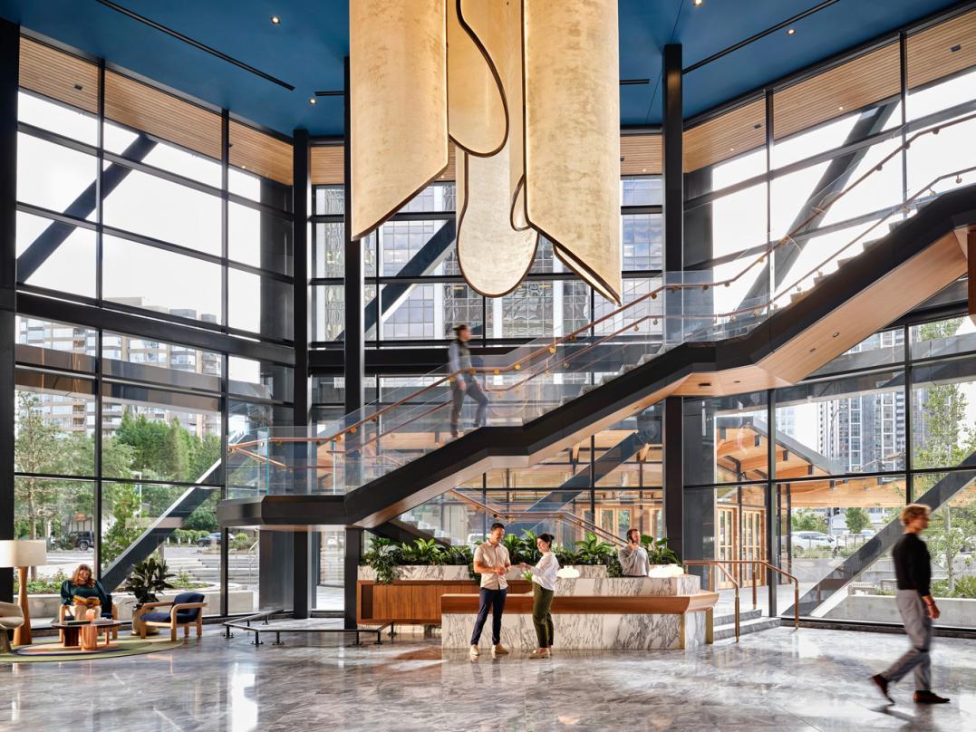 Visualization of the staircase and suspended roof designs inside our commercial office development design in Bellevue.