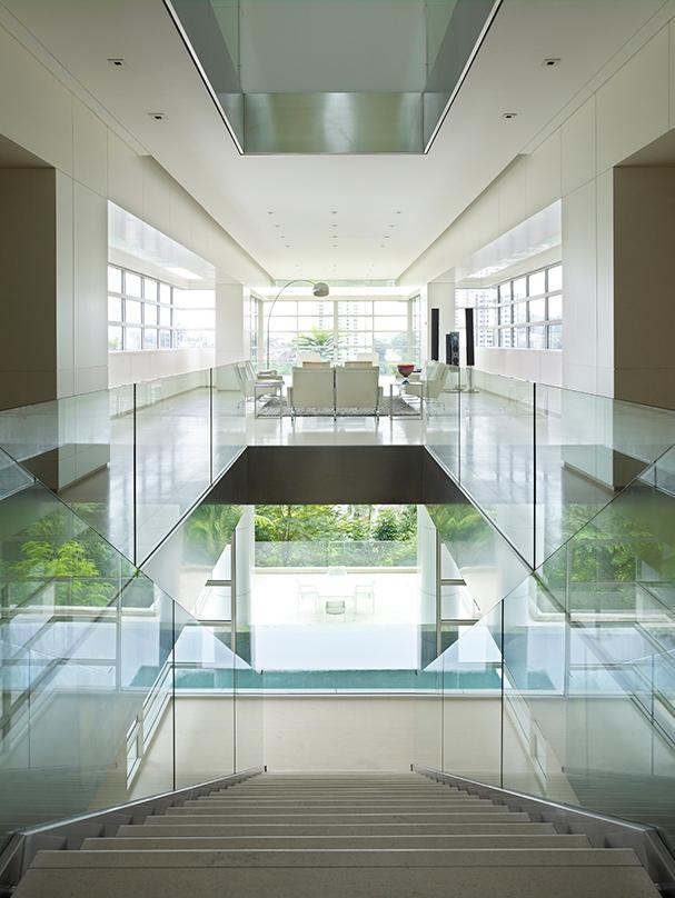 glass stair rails and open space hallway of a Private Residence in Kuala Lumpur