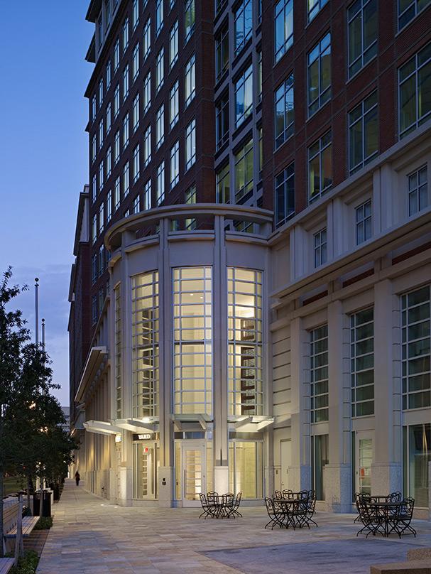 United States Environmental Protection Agency projecting entrance with a highly articulated stone and precast concrete base and refined brick enclosure with an expressive precast cornice