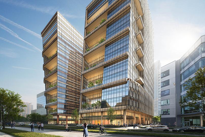 Pedestrian-friendly streetscape outside 250 and 290 Binney Street, featuring landscaped setbacks, wide sidewalks, and transparent ground-floor facades.