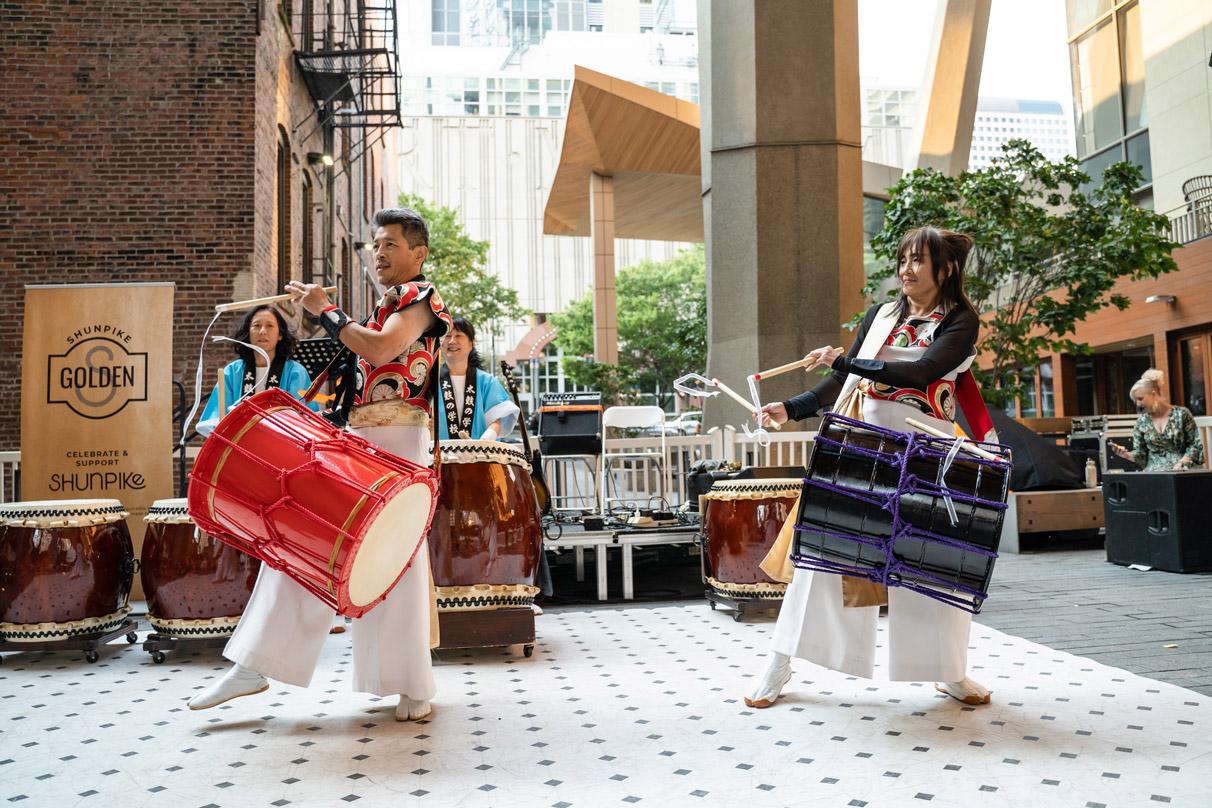 Drumming exhibition under the canopy at 2+U