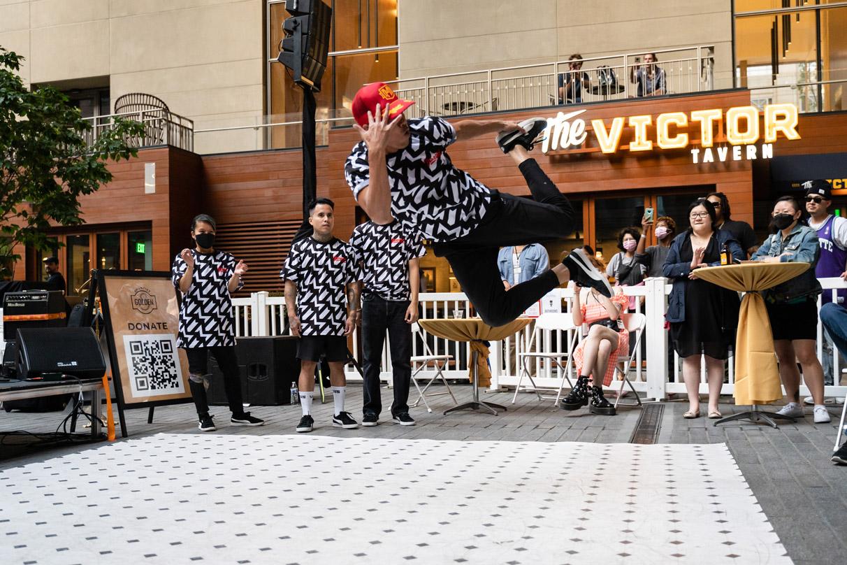 Break dancers at the urban village of 2+U