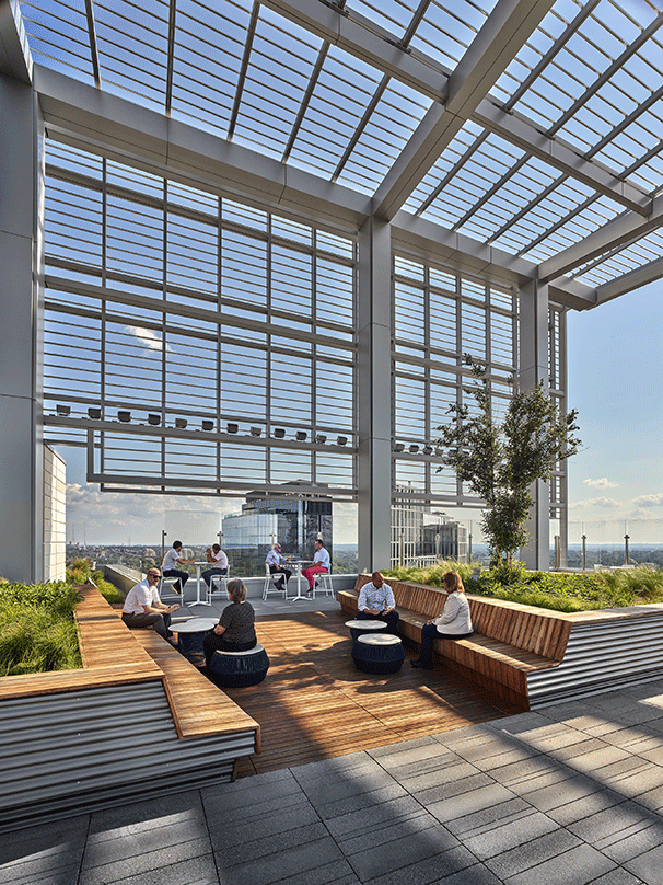 The upper level deck of the Avocet Tower, with a leisure area and adequate greenery.