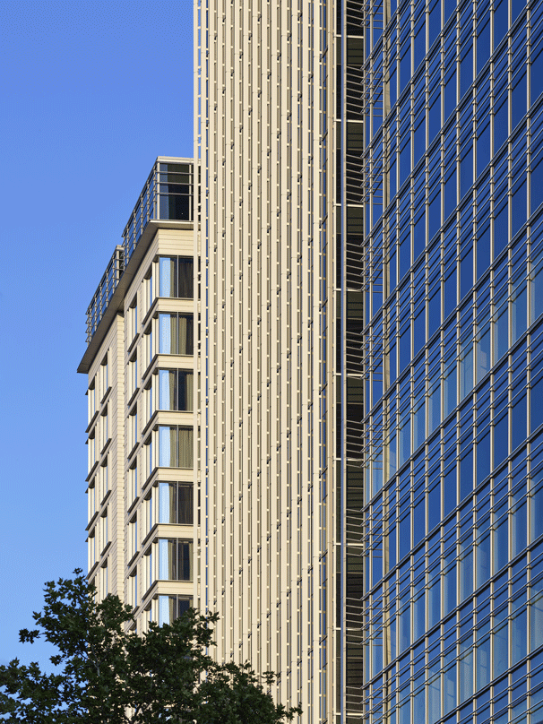 A street view looking up of the Avocet Tower a mixed-use hospitality building