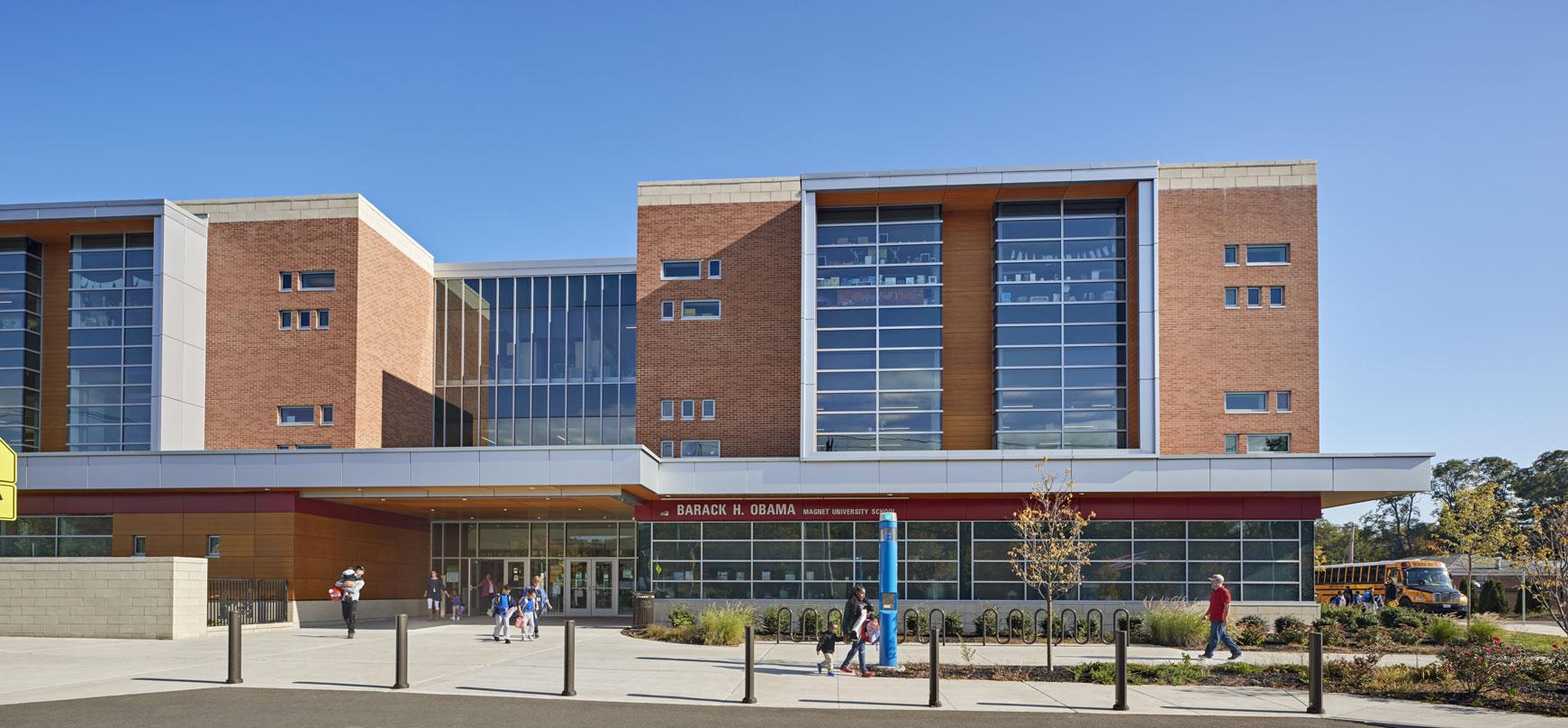 Parents picking up their children from the Barack H. Obama Magnet University school in New Haven, Connecticut