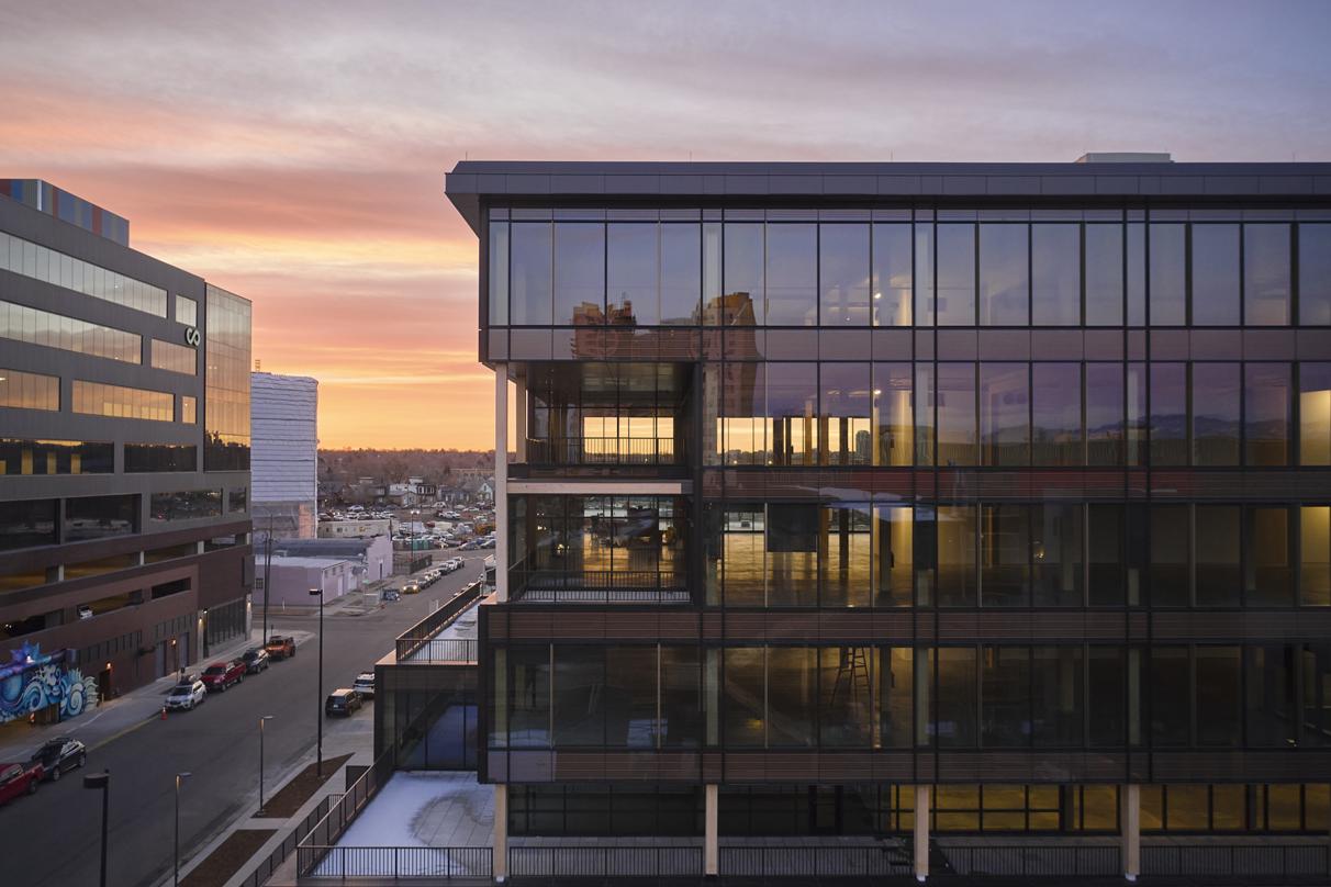 T3 RiNo is a six-story mass timber office building featuring numerous open terraces