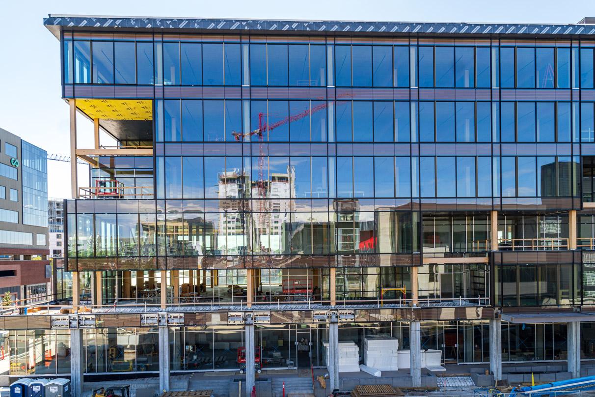 T3 RiNo is a six-story mass timber office building featuring numerous open terraces