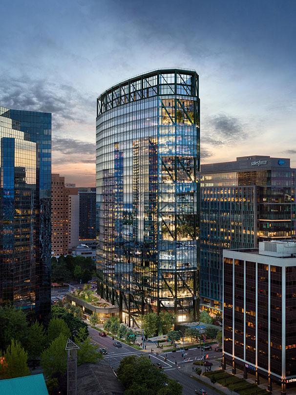 Directly located to transit and retail, Bellevue's tower The Eight illuminates the night