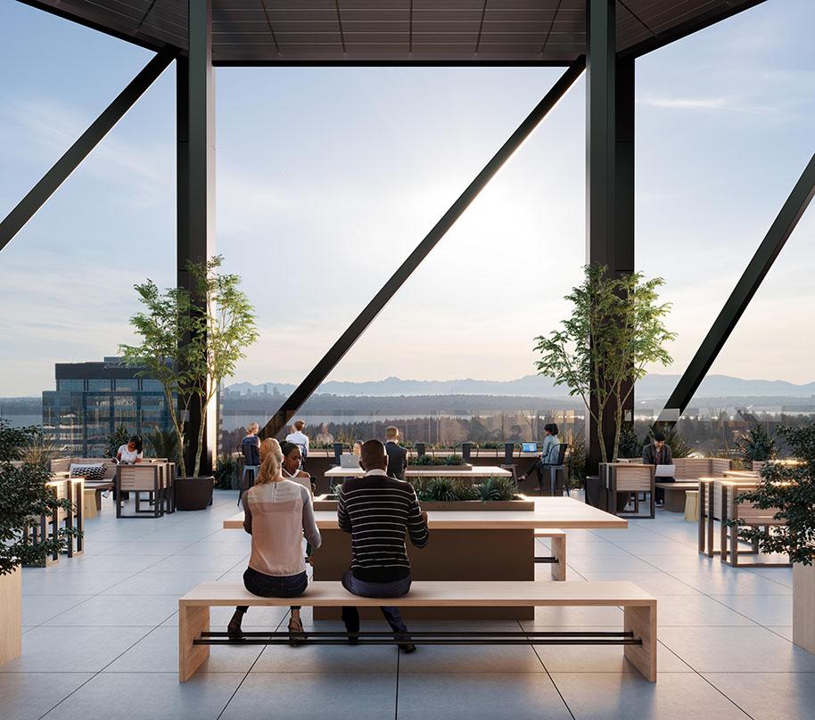 Open air rooftop terrace offers amenity spaces and views of the mountains