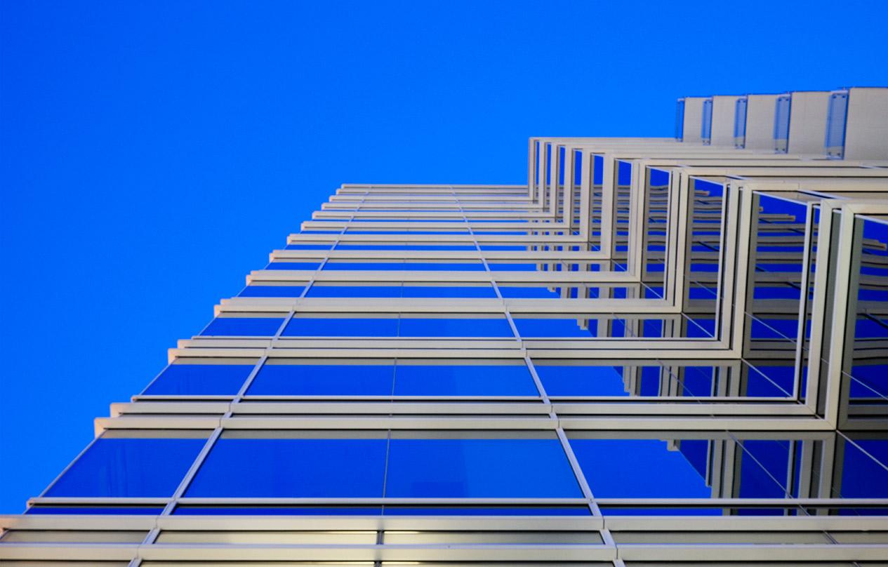 looking straign up the glass facade and deep blue sky - W Atlanta-Downtown and The Residences