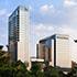 the sun reflecting on the glass facade of the mixed use business and residential building in W Atlanta-Downtown.