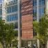 A large stone marker designates the entrance to the ExxonMobil office building