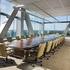 Conference room inside the ExxonMobil Energy Center with a picturesque view from the glass frame wall.