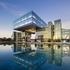 water reflecting a cantilever building design ExxonMobil Office Complex