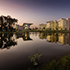 a view from across the pond of the ExxonMobil Wellness Center and full campus 