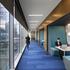 Blue-floored hallway inside the 20-storey 600 Canal Place located in Richmond, Virginia.