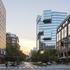 pedestrian view of the Akamai Headquarters building designed with five interlocking bars create a series of cantilevers 