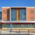 Exterior view of the Barack H. Obama Magnet University school, a three-storey brick-clad building in New Haven, Connecticut.