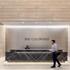 The minimalist design for welcome desk at 300 Colorado in downtown Austin.