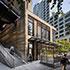 Retail building and rammed earth geowall of 2+U