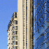 A street view looking up of the Avocet Tower a mixed-use hospitality building