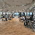 The workout room at Avocet Tower with glass frame walls.