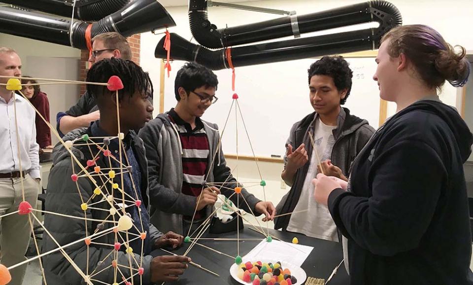 High School students learn about architecture, construction and engineering with the ACE Mentor Program.