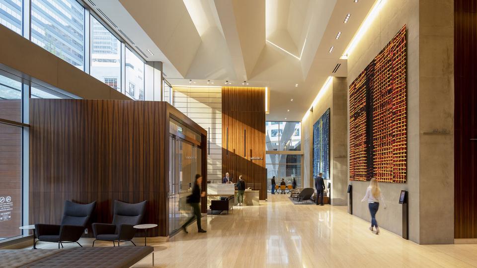 A bustling lobby in Denver's 2+U tower