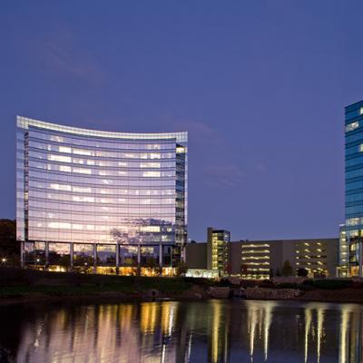 The curvilinear exterior of Newell Rubbermaid’s headquarters reflecting in the two-acre pond at Atlanta, Georgia. 