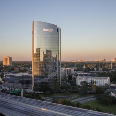 The exterior view of Amegy Bank’s new headquarters built with curved glass facades, located in Houston, Texas.