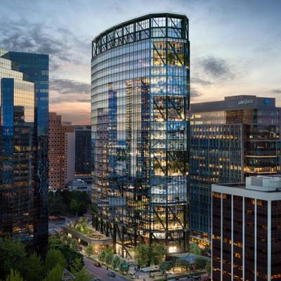 A view of The Eight at dusk. a next-generation Class A commercial office development in Bellevue’s downtown core that will serve as the gateway to the city center